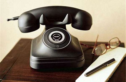 Teléfono fijo de toque retro, e inalámbrico Foto Teléfono fijo de toque retro, e inalámbrico